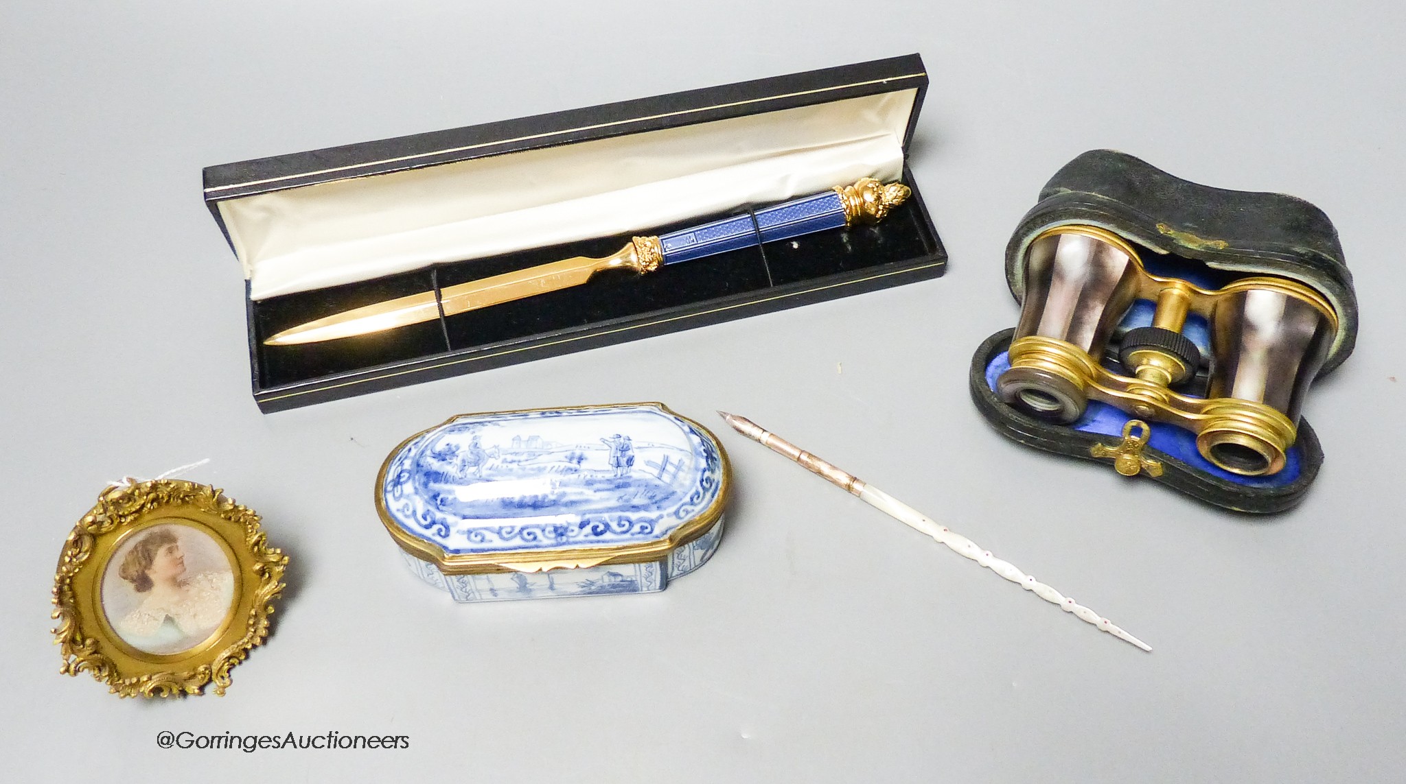 A Delft box, miniature binoculars, a mother of pearl pen and a letter opener, etc.